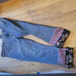 Blue jeans with ribbon cuffs
